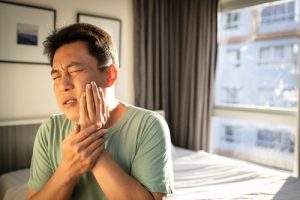 man with tooth pain