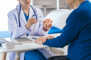 dentist and patient talking