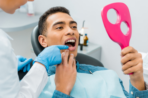 man at dentist office