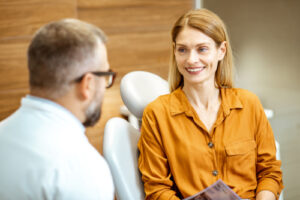 Beautiful,Adult,Woman,As,A,Patient,With,Senior,Dentist,During