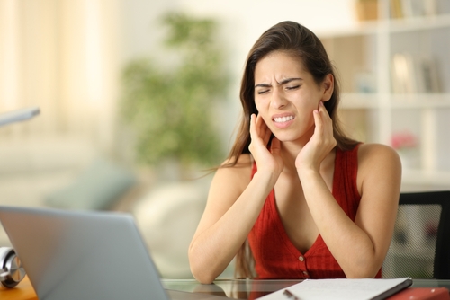 Stressed,Student,Suffering,Temporomandibular,Ache,At,Home